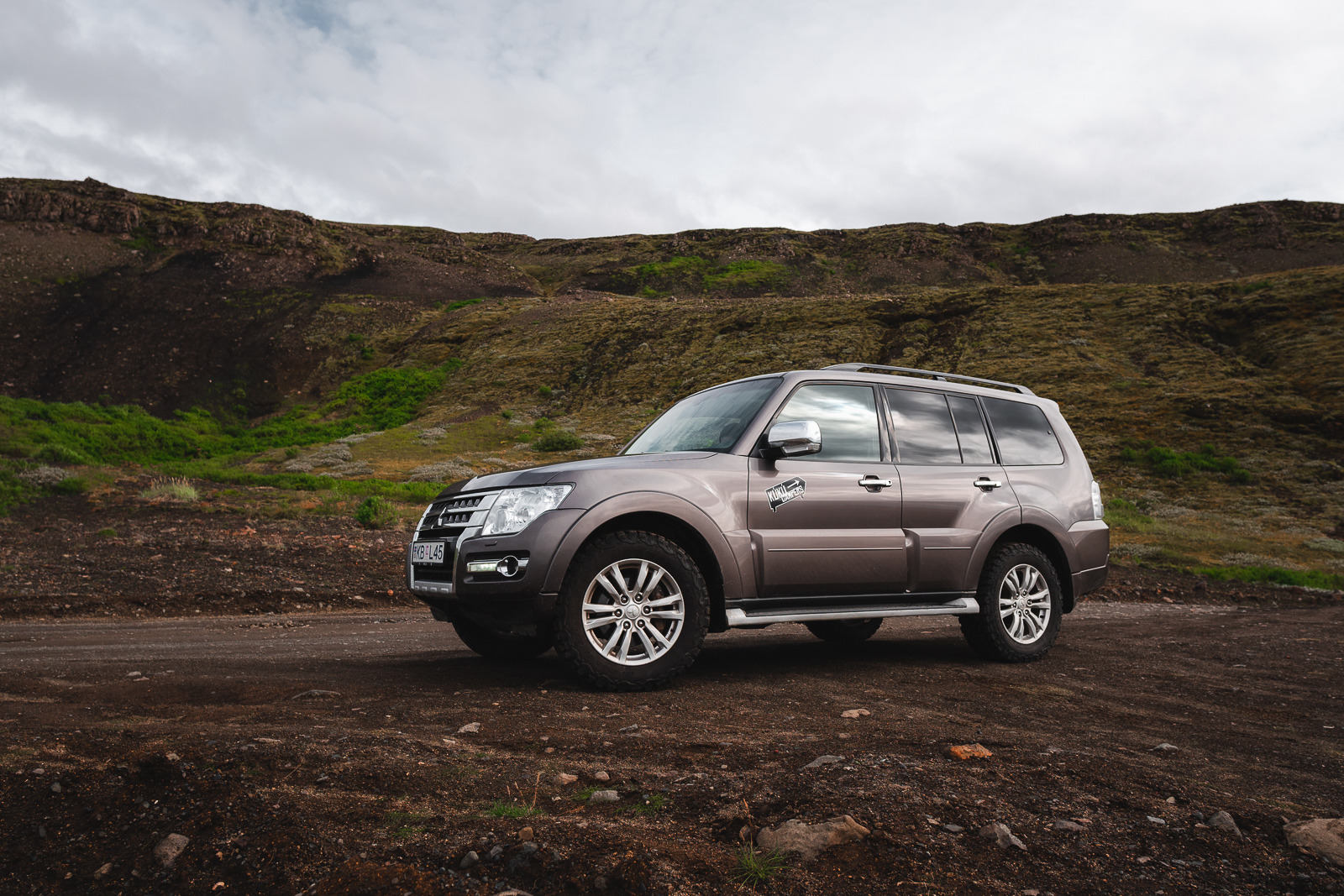 A camper-ready SUV posing like it's on a magazine cover—just missing the wind machine and a dramatic puffin.
