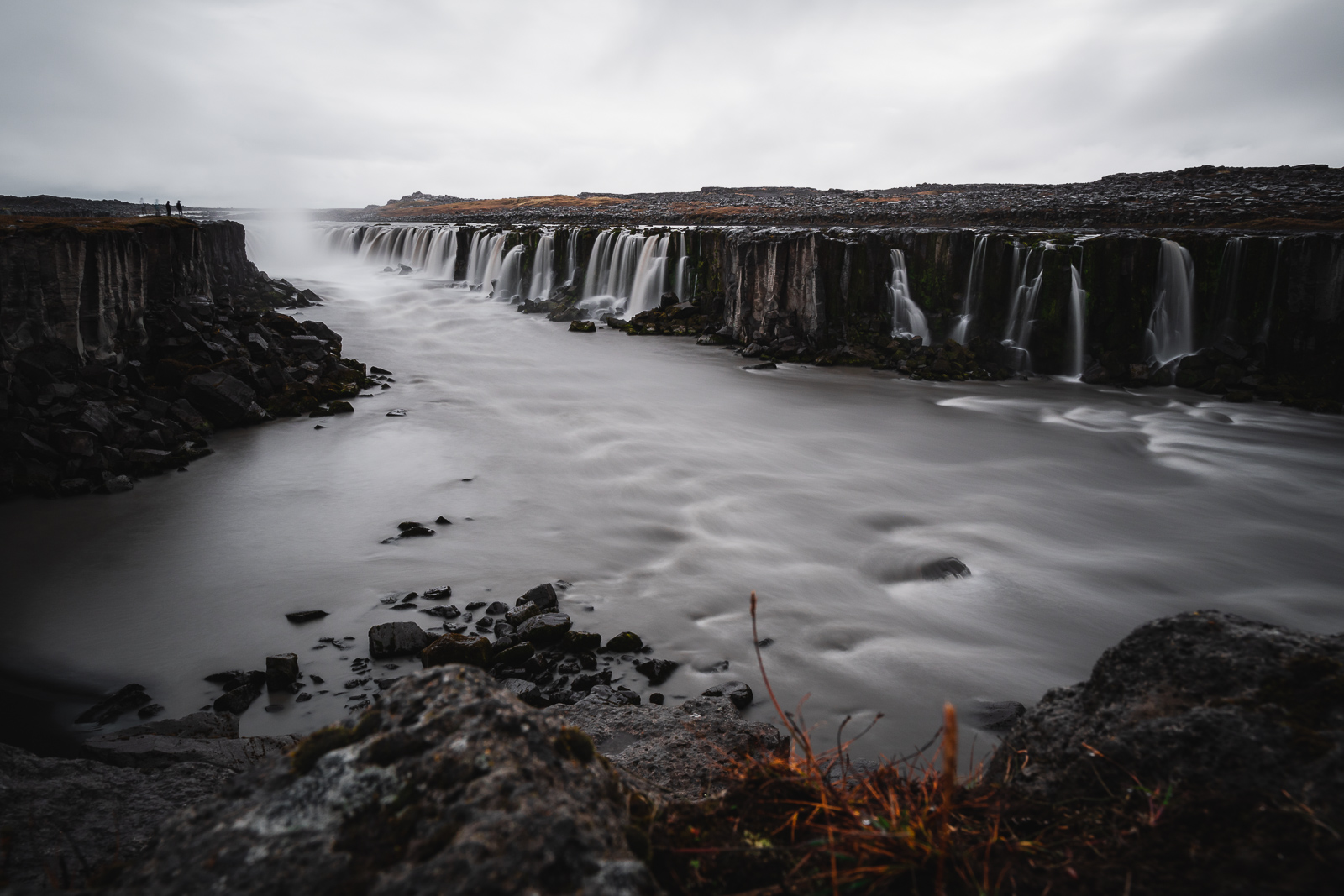 Powerful glacial waters plunge into a rocky canyon at Selfoss waterfall, a stunning stop just upstream from mighty Dettifoss.