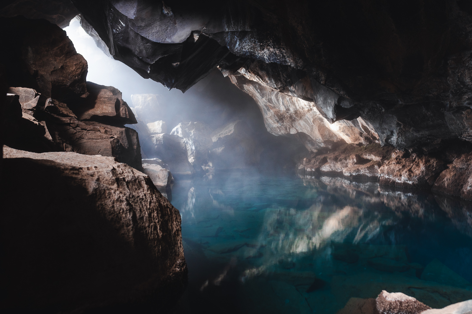 A dreamy view inside Grjótagjá cave, where crystal-clear thermal waters shimmer under lava rock ceilings. Just don’t jump in — it’s too hot for comfort.