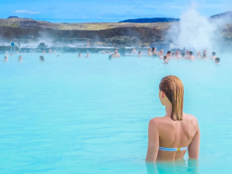 people bathing in Blue Lagoon Iceland