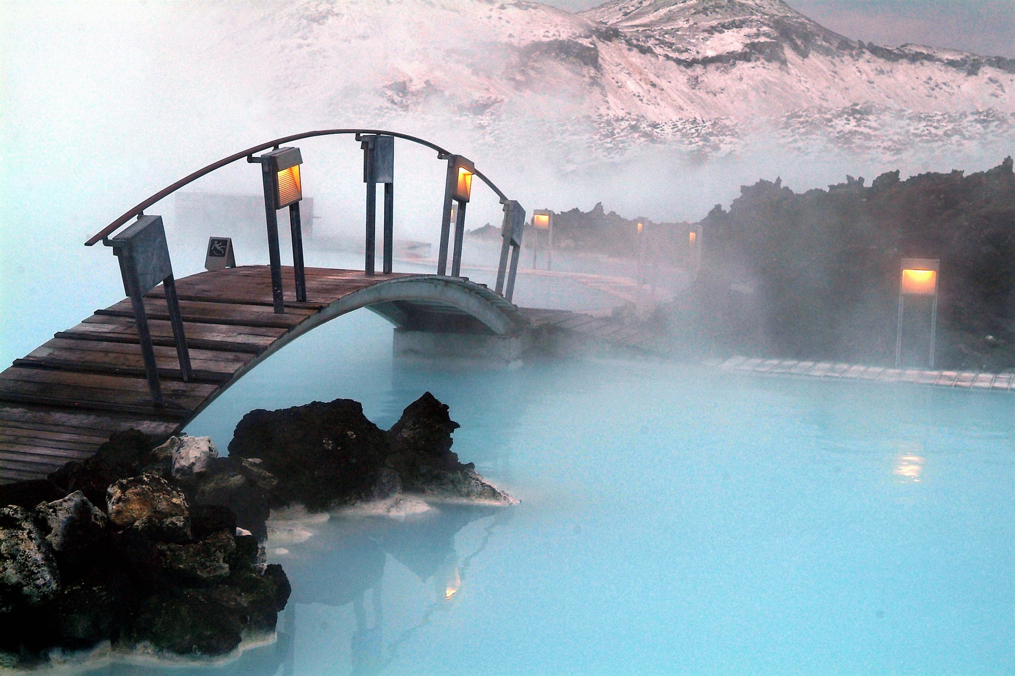 Blue lagoon iceland, blue water with a wooden bridge