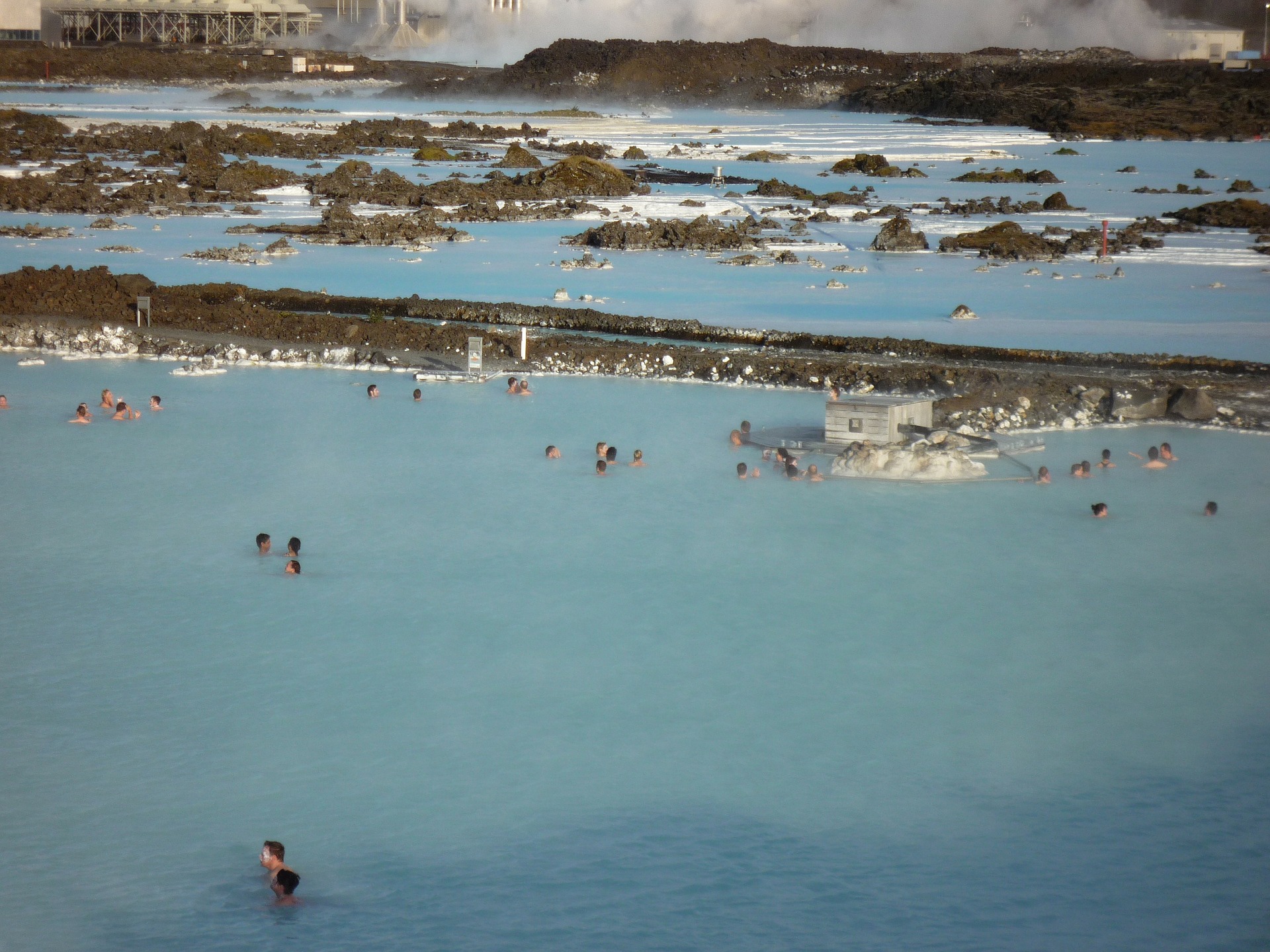 Overview of Blue Lagoon in Iceland with people bathing in the hot water