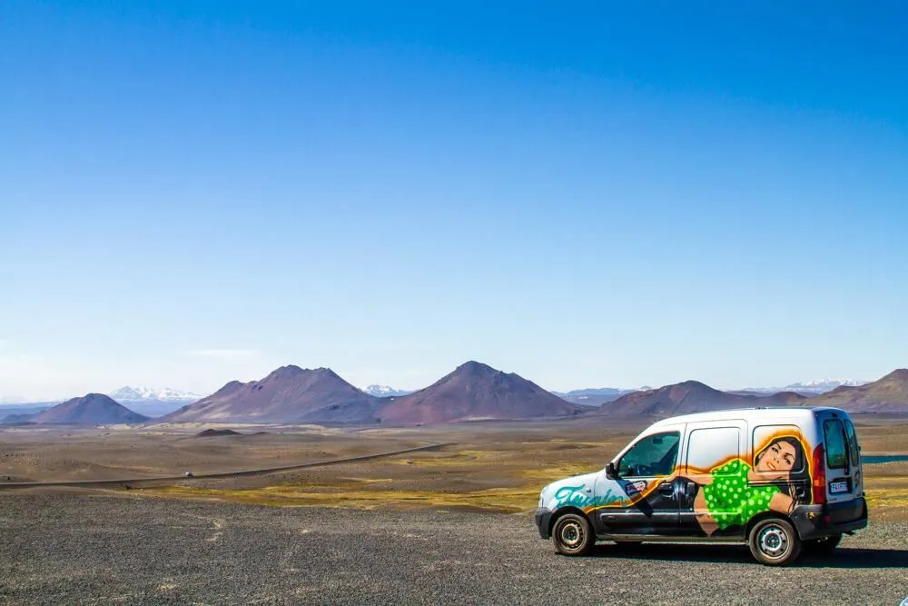 A KuKu campervan parked in Iceland’s wild landscape, where the views are free but everything else is not