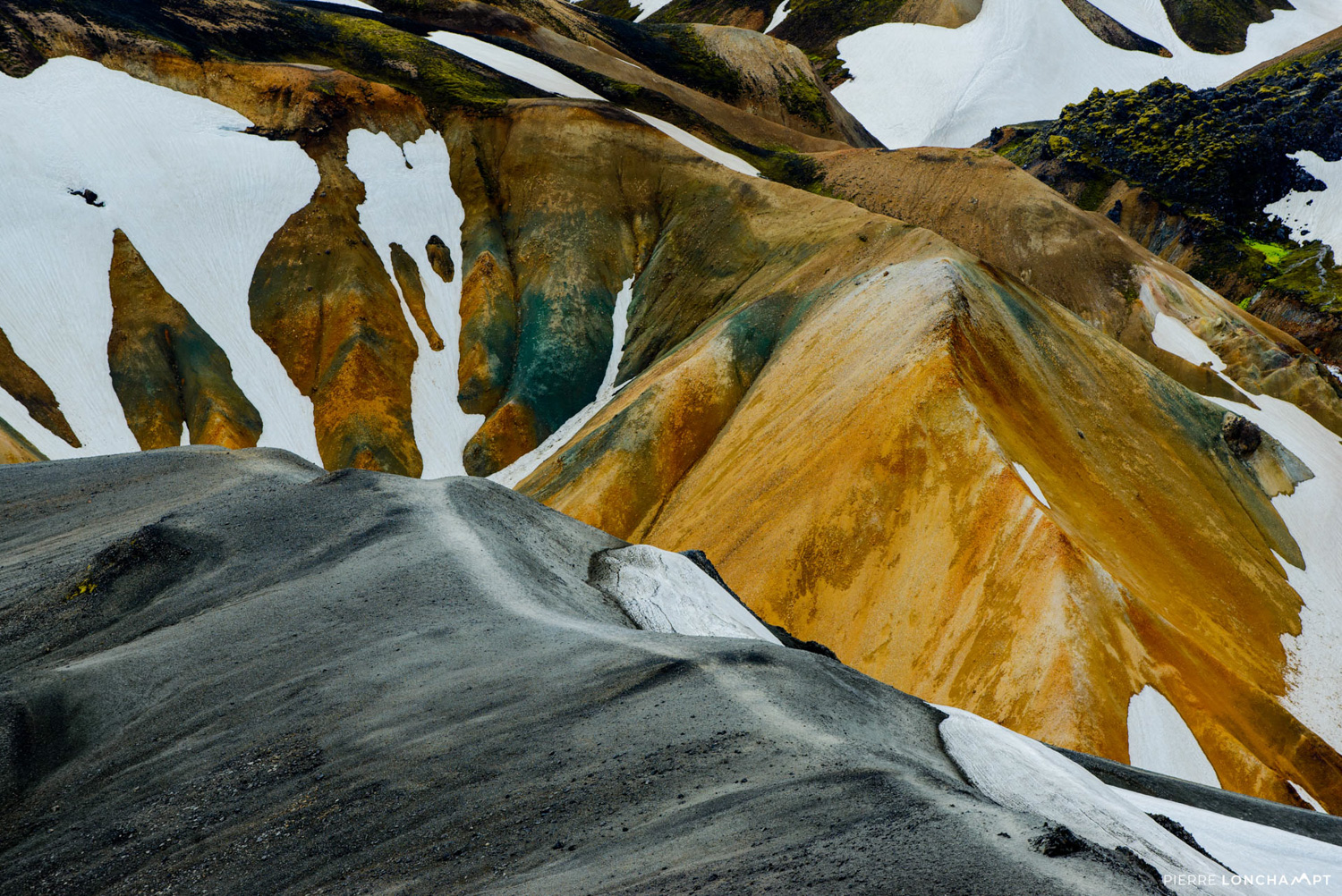 A close-up of the stunning rhyolite peaks in Landmannalaugar, showcasing Iceland’s surreal volcanic beauty
