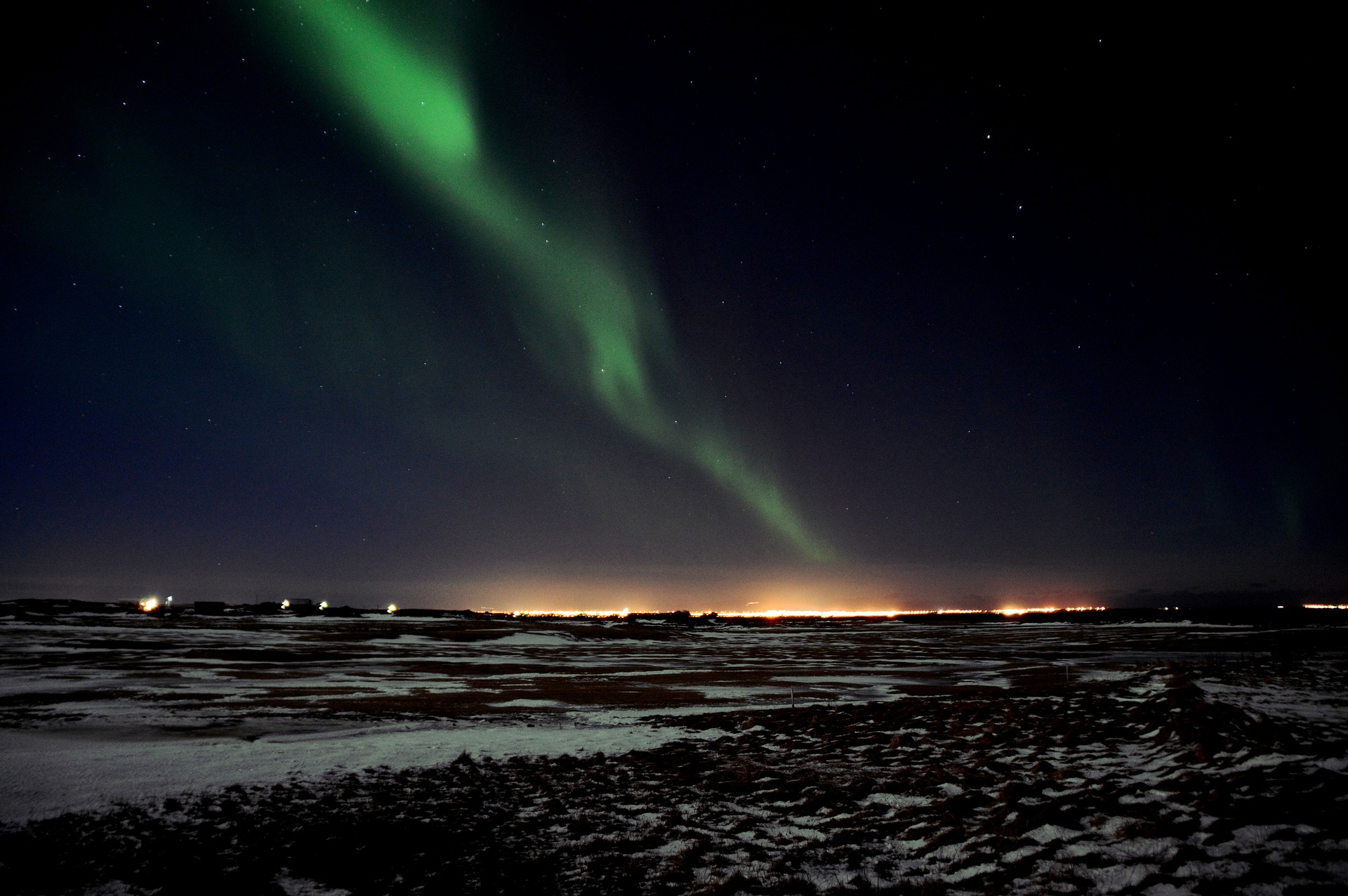 Northern Light Iceland Northern light in Iceland with light pollution on the back ground