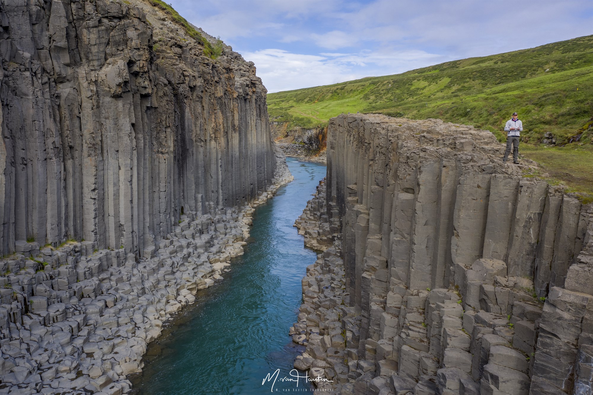 Experience the magic of Stuðlagil Canyon while hiking in Iceland. Admire towering basalt columns and the vibrant green river below