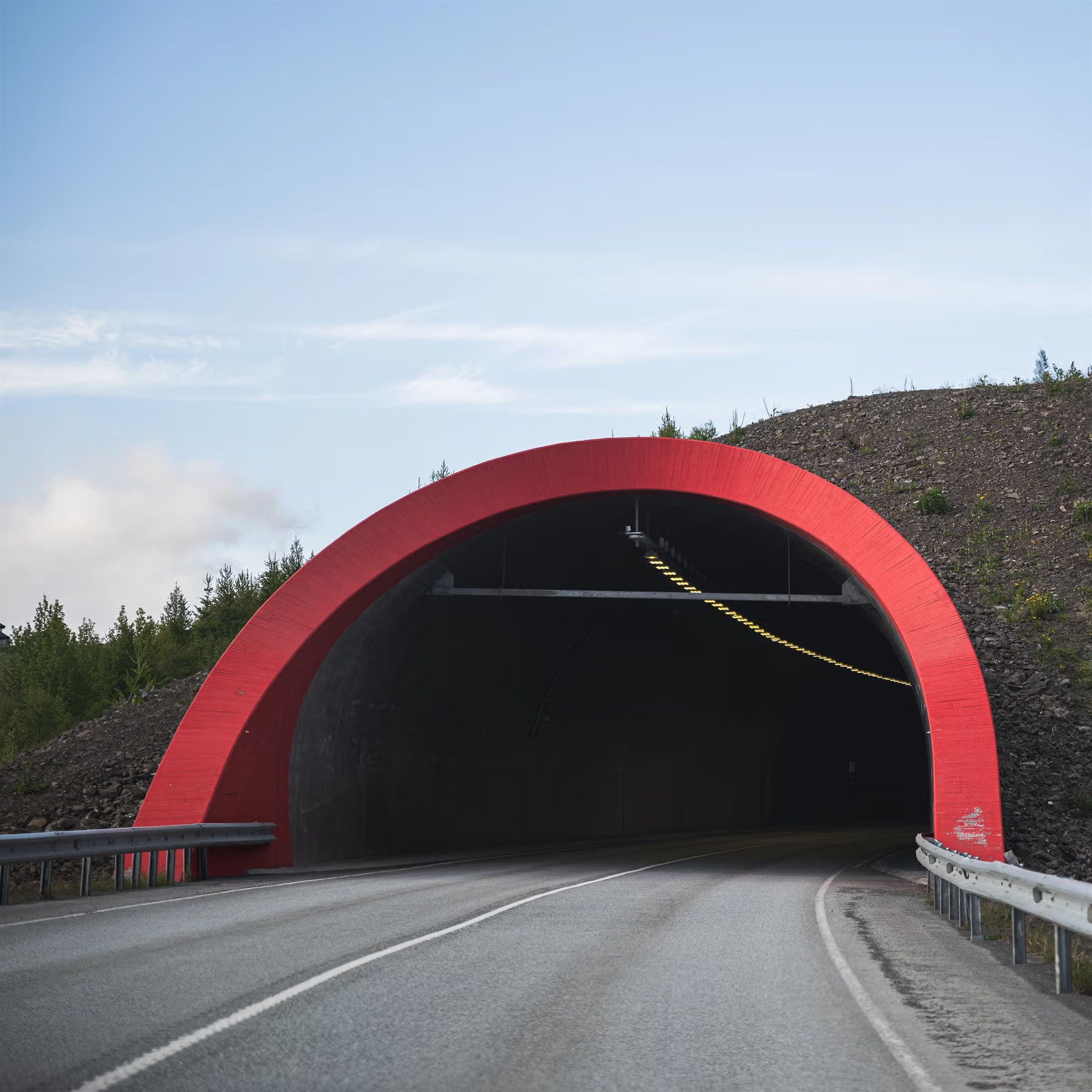 Interior view of an Icelandic tunnel road, representing the rare case of toll infrastructure in the country.